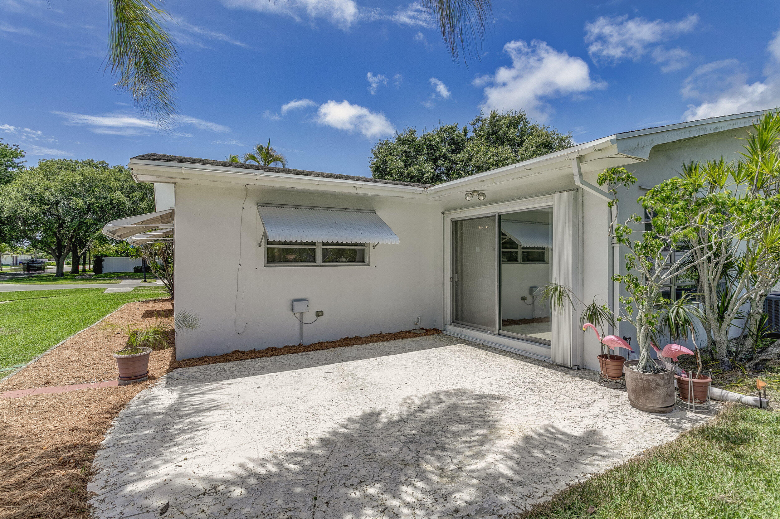 501 Inlet Road North Palm Beach, FL 33408 - Photo 31 of 58 a front view of a house with a yard