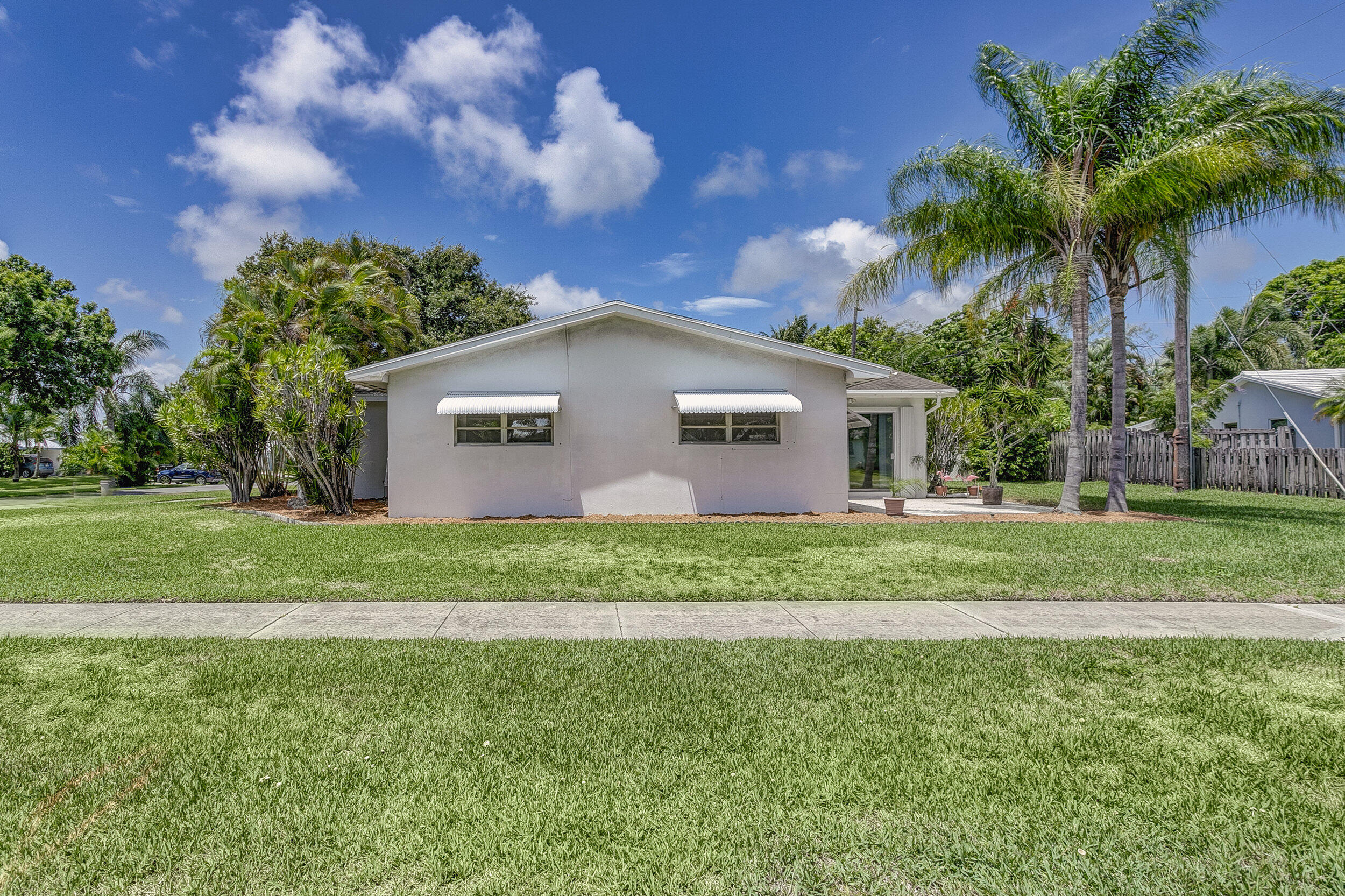 501 Inlet Road North Palm Beach, FL 33408 - Photo 36 of 58 a view of a house with a backyard