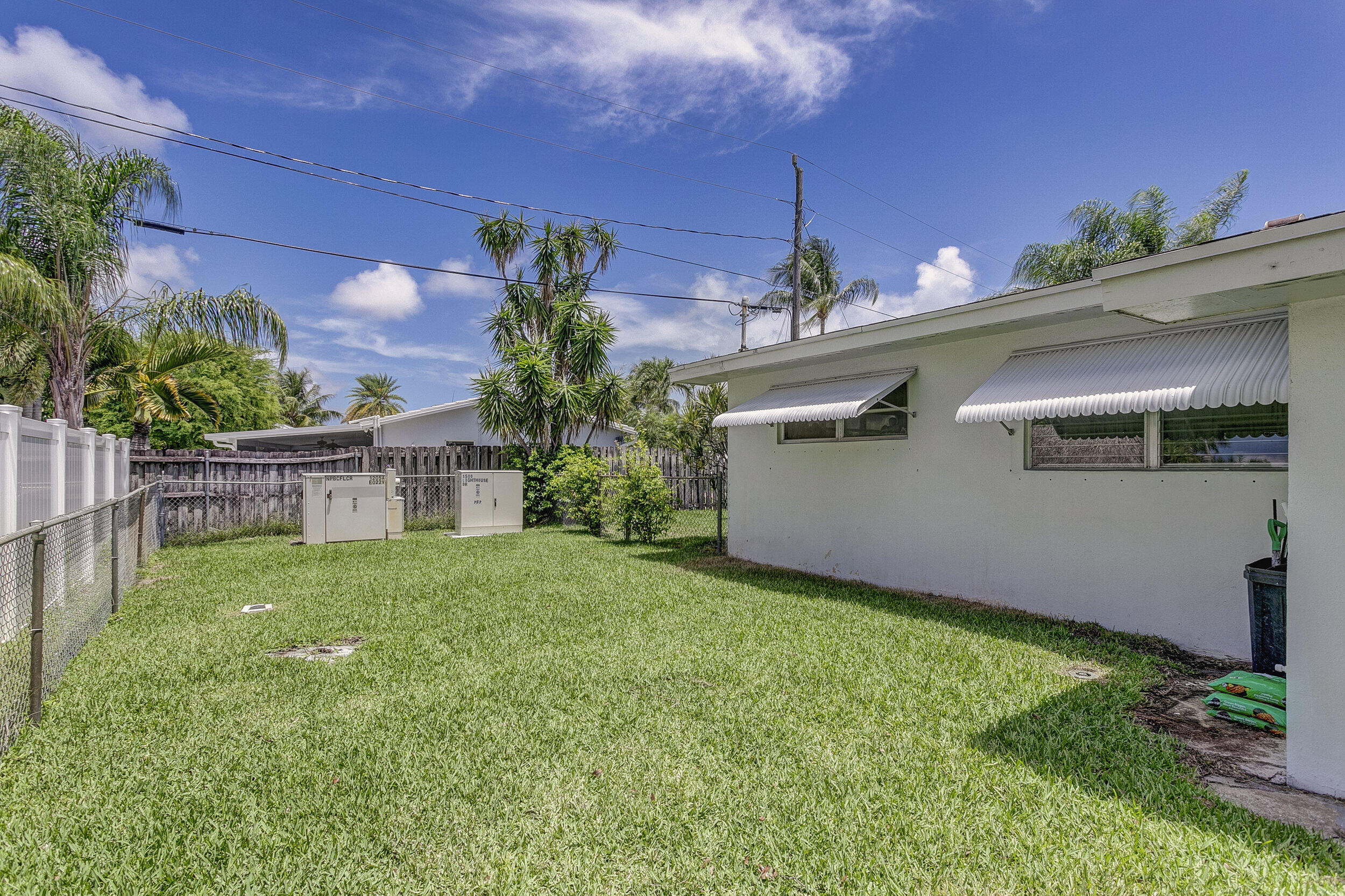 501 Inlet Road North Palm Beach, FL 33408 - Photo 42 of 58 a view of a house with backyard and garden