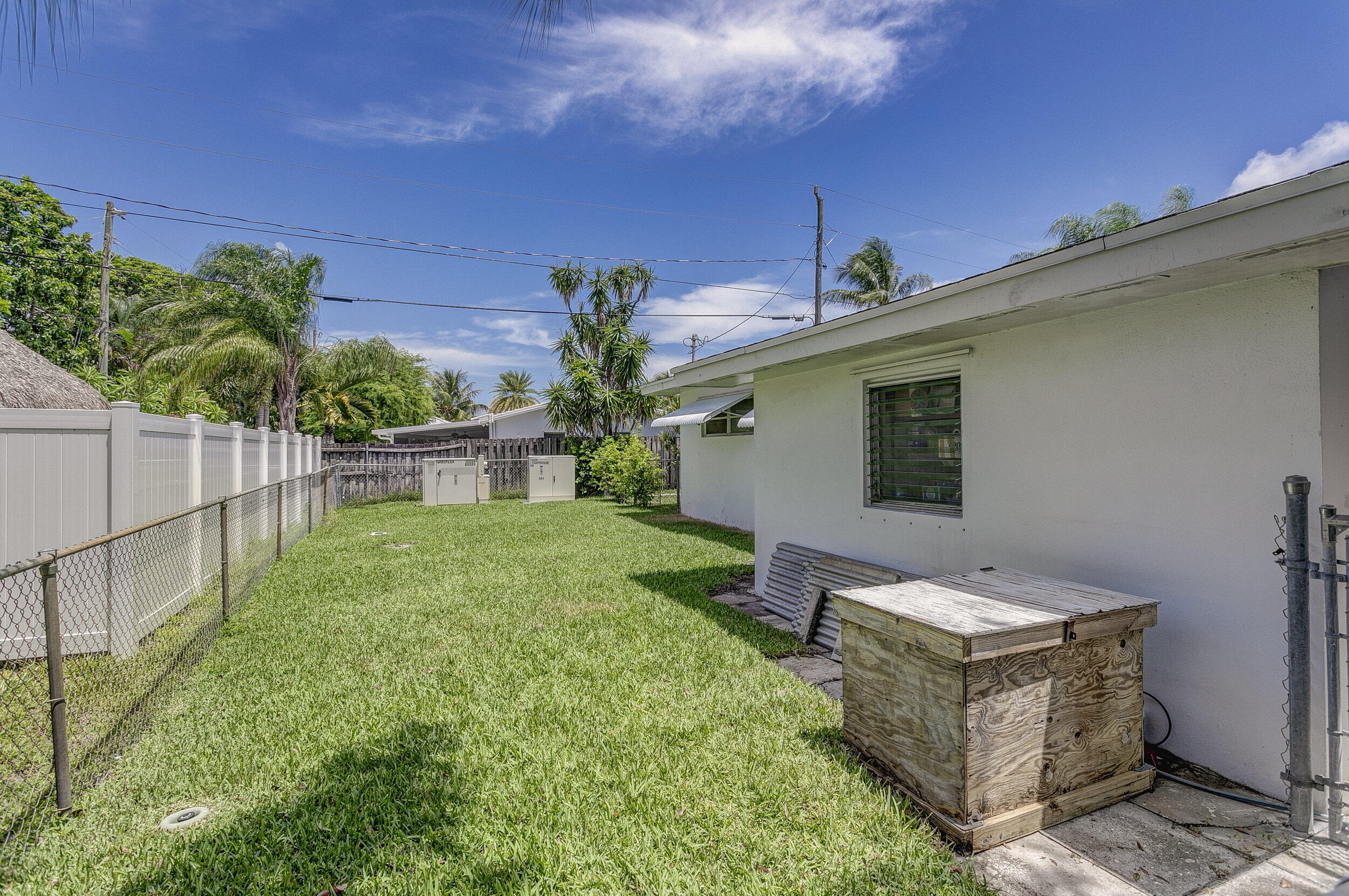 501 Inlet Road North Palm Beach, FL 33408 - Photo 43 of 58 a view of a backyard with plants