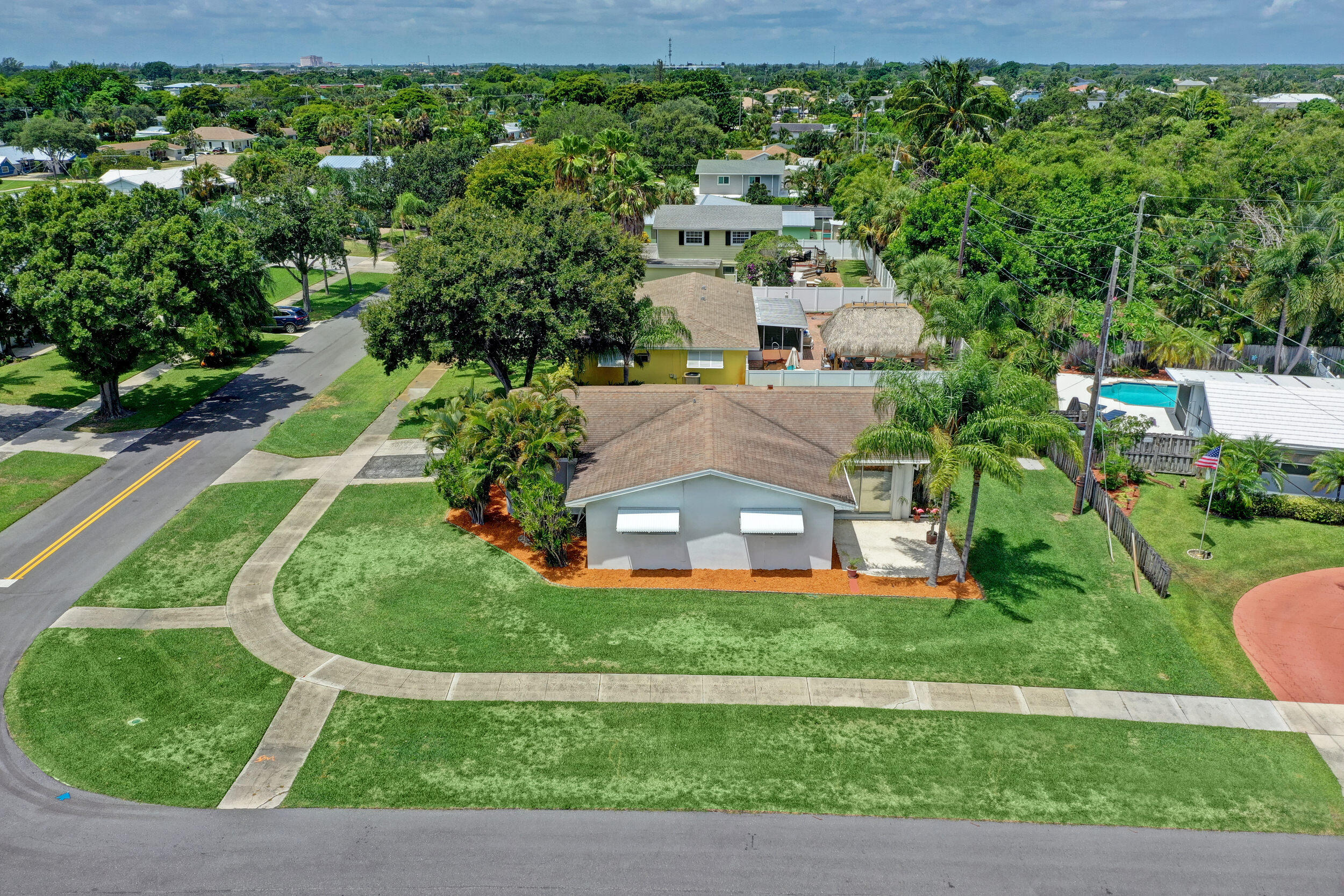 501 Inlet Road North Palm Beach, FL 33408 - Photo 47 of 58 a aerial view of a house with a yard