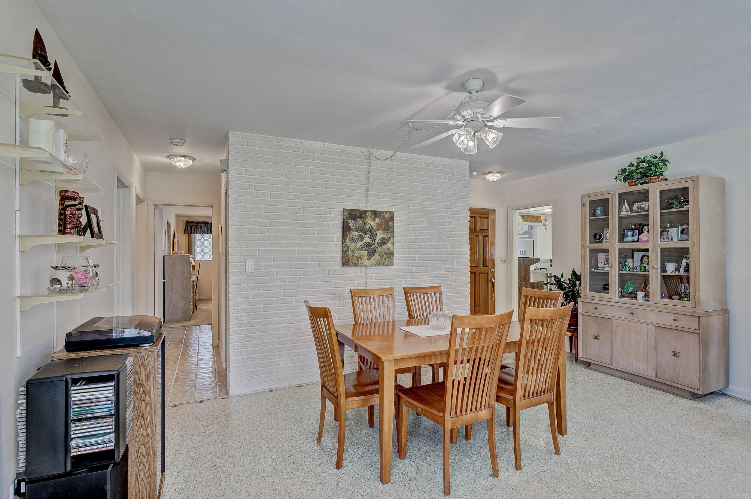 501 Inlet Road North Palm Beach, FL 33408 - Photo 7 of 58 a view of a dining room with furniture and chandelier