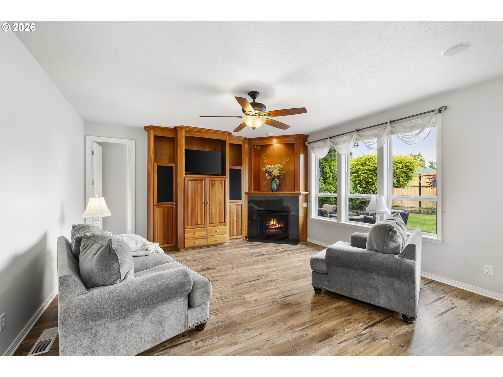 535 Maple Street Mount Angel, OR 97362 - Photo 16 of 48 a living room with furniture and a large window