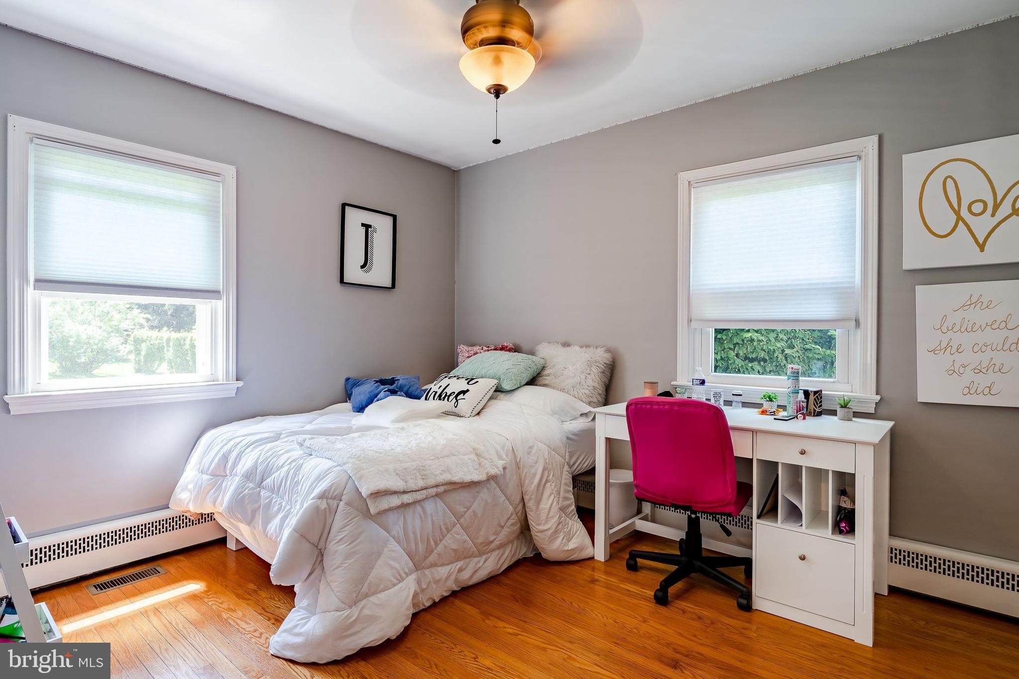 1538 Carmac Road West Chester, PA 19382 - Photo 11 of 33 a bedroom with a bed a window and book shelfs