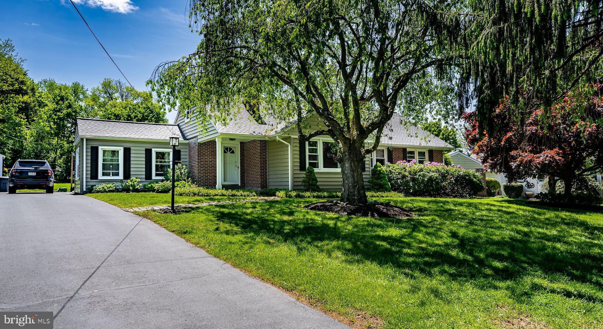 1538 Carmac Road West Chester, PA 19382 - Photo 2 of 33 a front view of a house with a yard