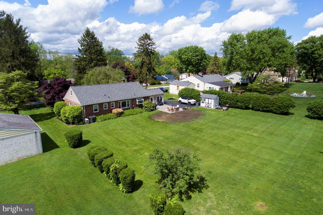 1538 Carmac Road West Chester, PA 19382 - Photo 31 of 33 an aerial view of a house with backyard garden and outdoor seating