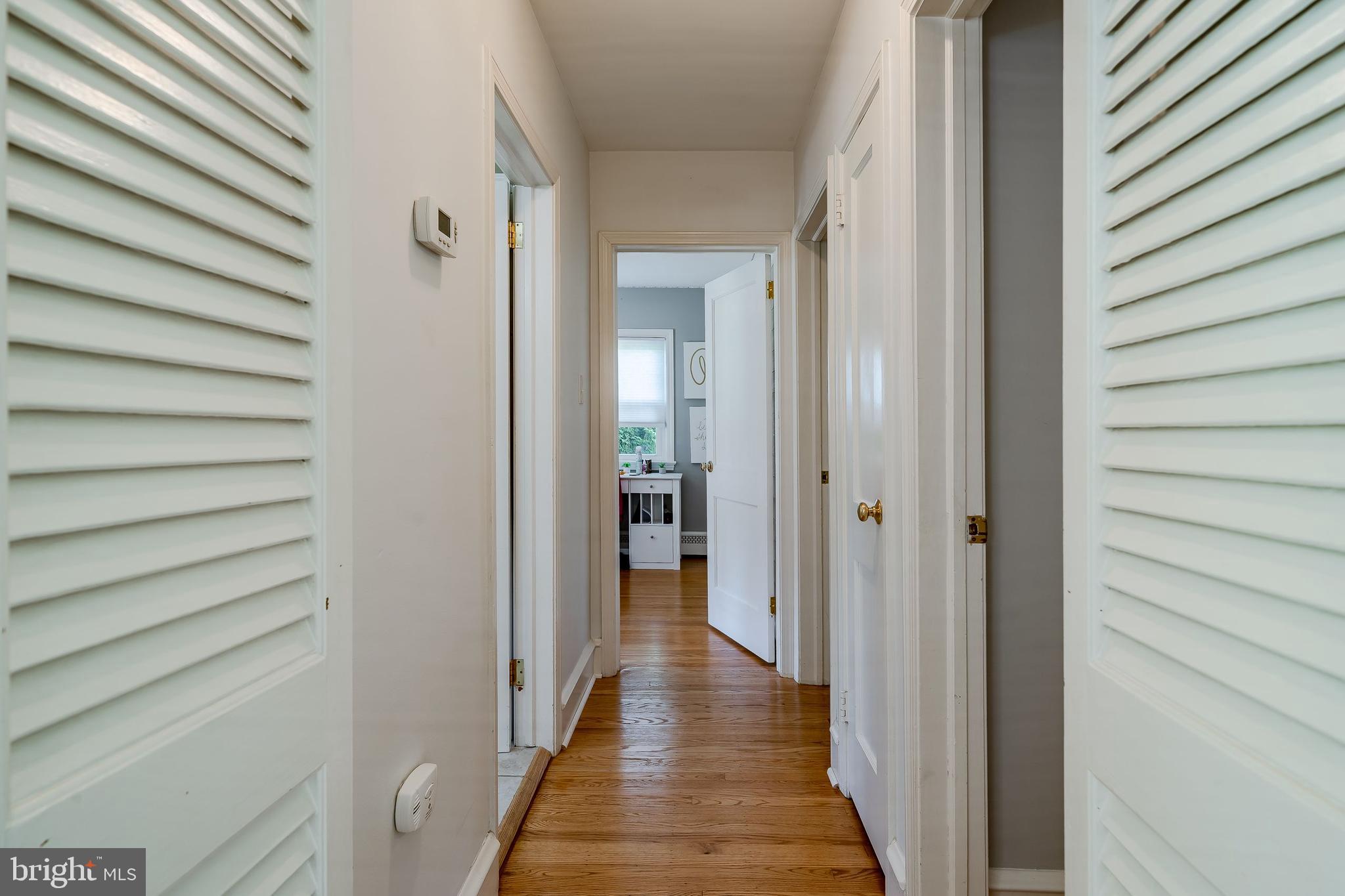 1538 Carmac Road West Chester, PA 19382 - Photo 9 of 33 a view of a hallway with wooden floor