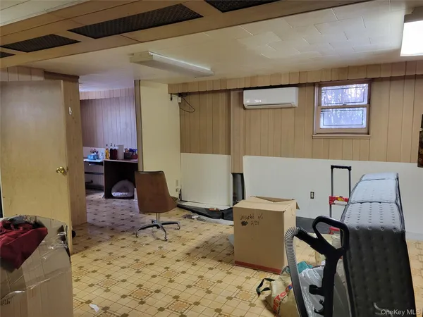 a workspace with furniture and window