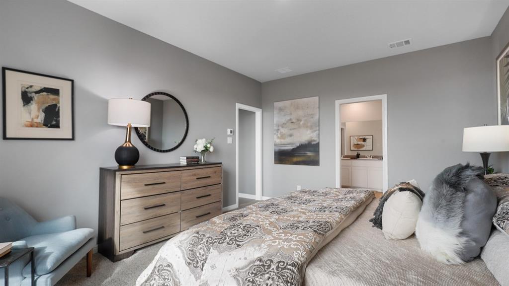 317 Potato Street Keene, TX 76059 - Photo 16 of 36 a bedroom with a bed and a dresser