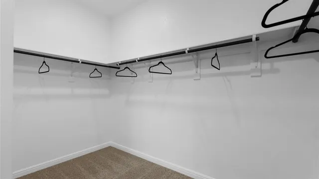 a bathroom with a double vanity sink and mirror
