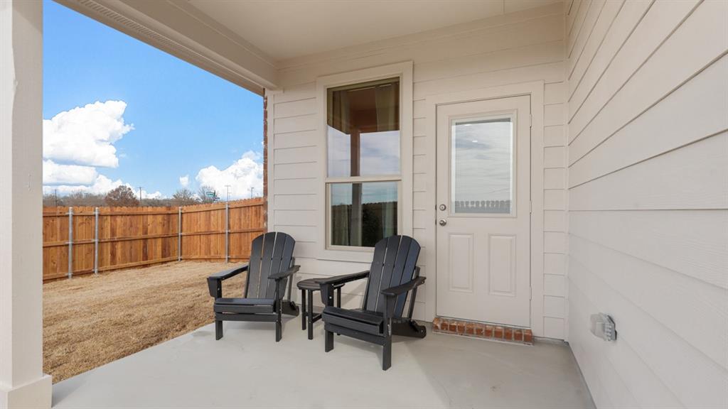 317 Potato Street Keene, TX 76059 - Photo 33 of 36 a living room with furniture