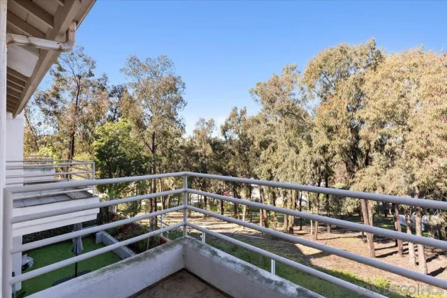 a bathroom with a bathtub sink and mirror