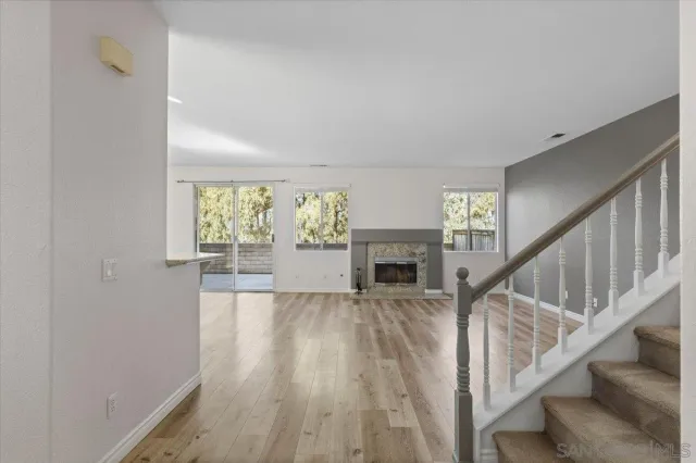 a kitchen with stainless steel appliances a refrigerator and a stove top oven