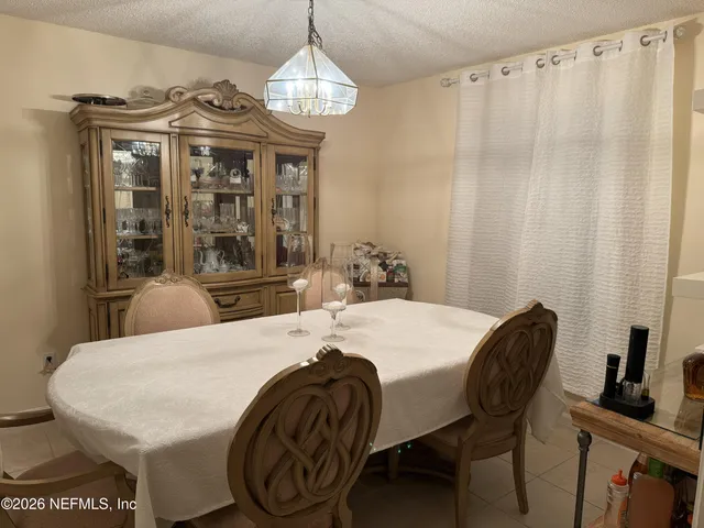 a bathroom with a toilet sink and shower