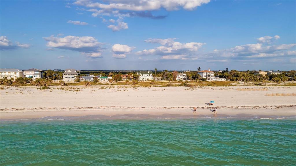 1058 Eldorado Avenue Clearwater Beach, FL 33767 - Photo 47 of 79 a view of an ocean and beach