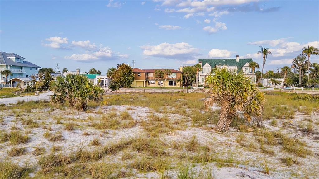 1058 Eldorado Avenue Clearwater Beach, FL 33767 - Photo 48 of 79 a view of a lake with houses
