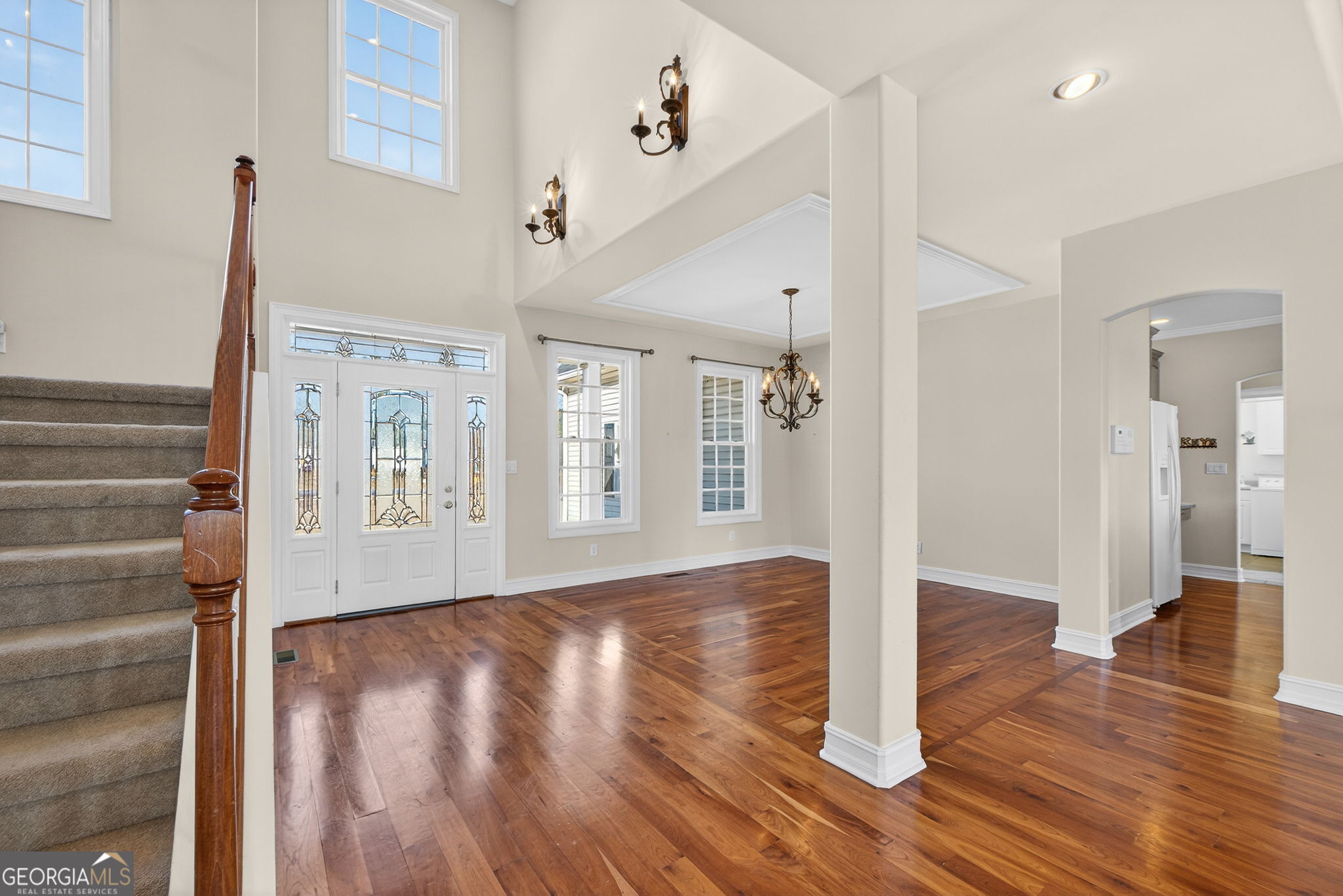 357 Canvasback Trail Locust Grove, GA 30248 - Photo 13 of 35 a view of an entryway with wooden floor and door
