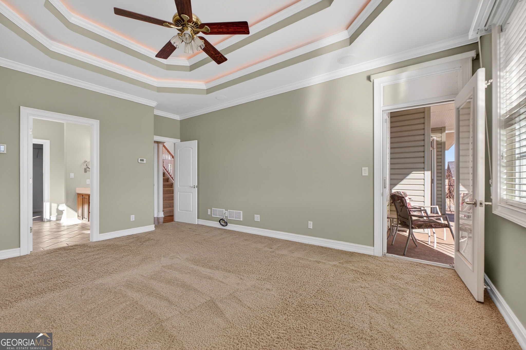 357 Canvasback Trail Locust Grove, GA 30248 - Photo 16 of 35 a view of an empty room with a fireplace