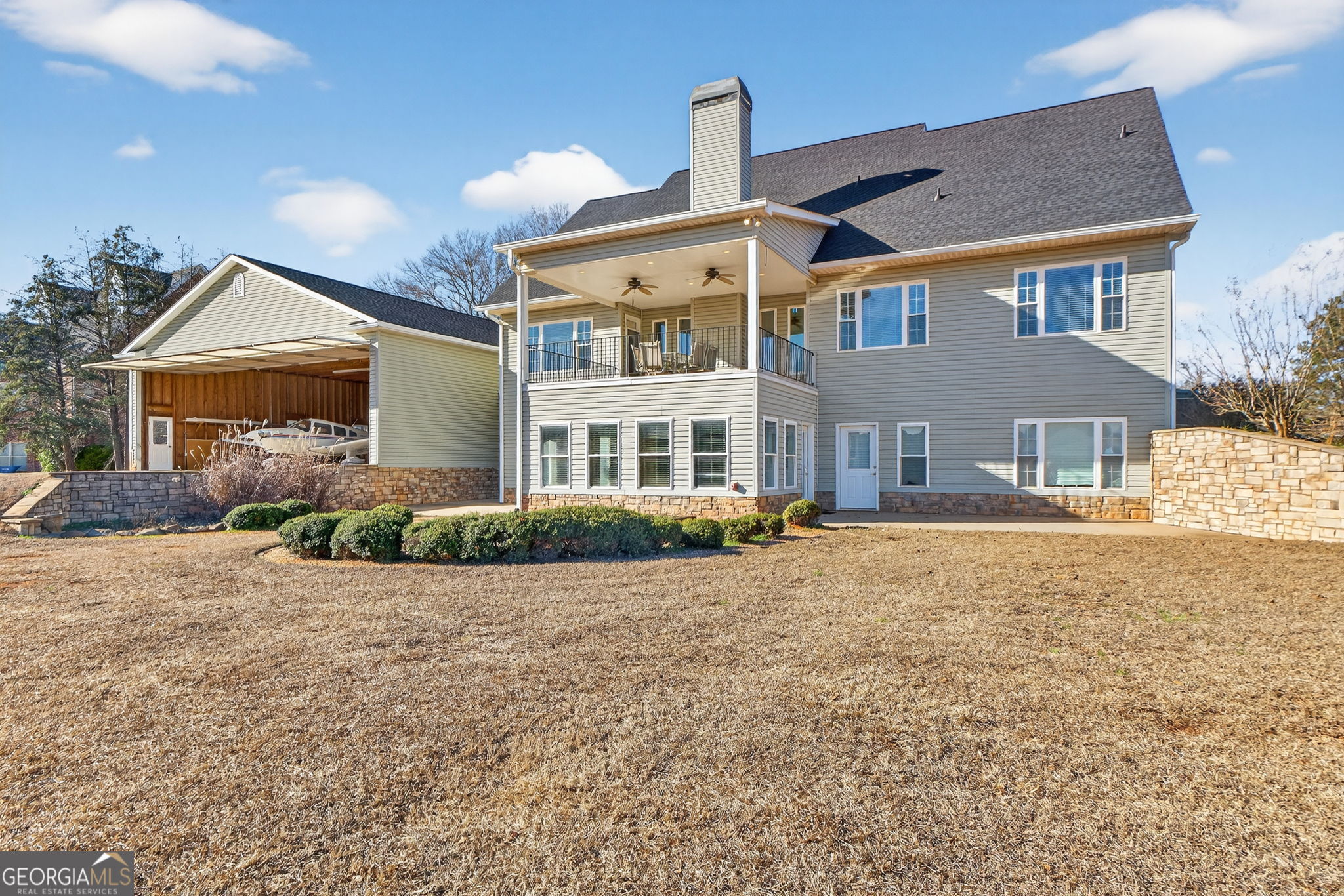 357 Canvasback Trail Locust Grove, GA 30248 - Photo 34 of 35 a front view of a house with a yard