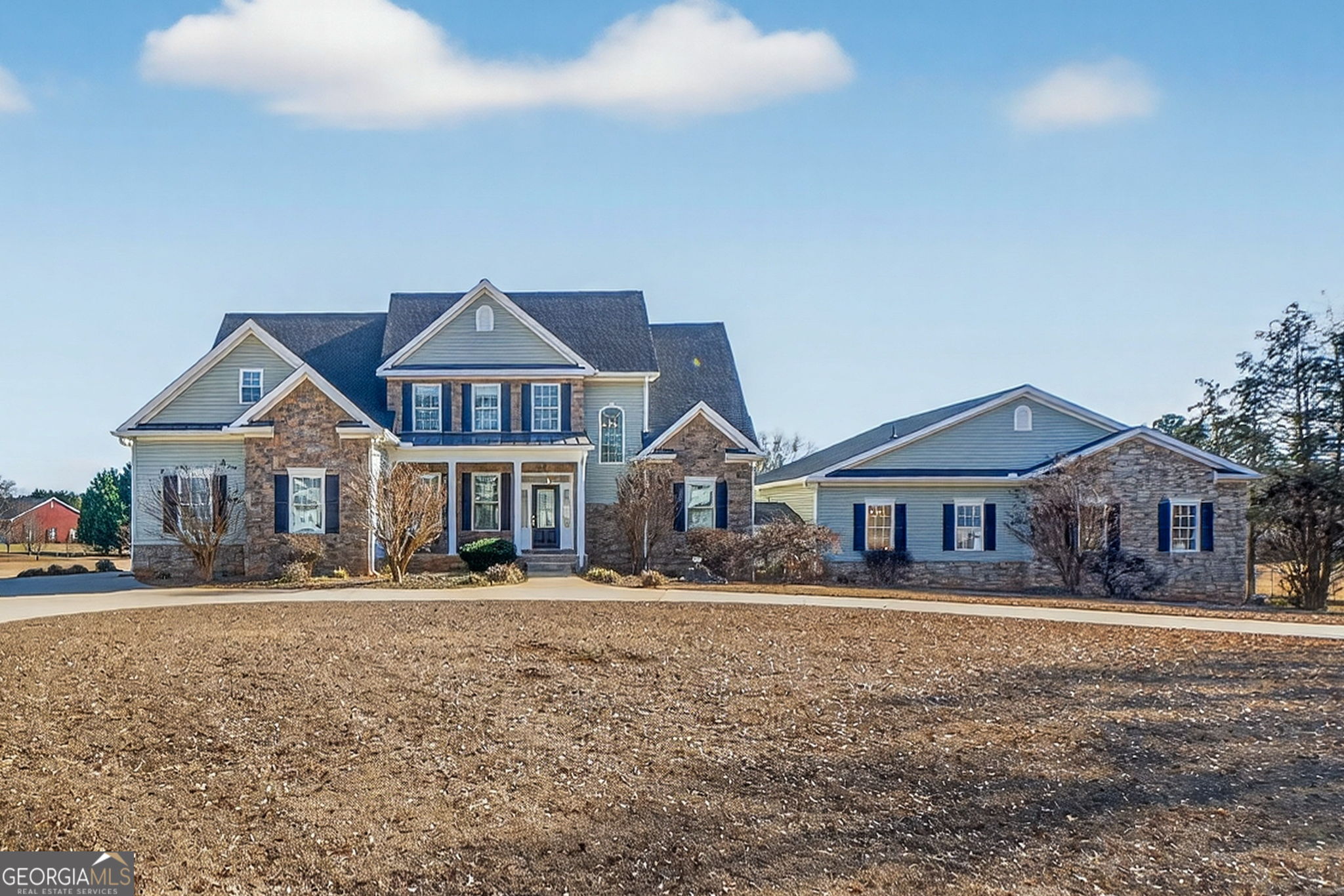 357 Canvasback Trail Locust Grove, GA 30248 - Photo 5 of 35 front view of a house next to a yard