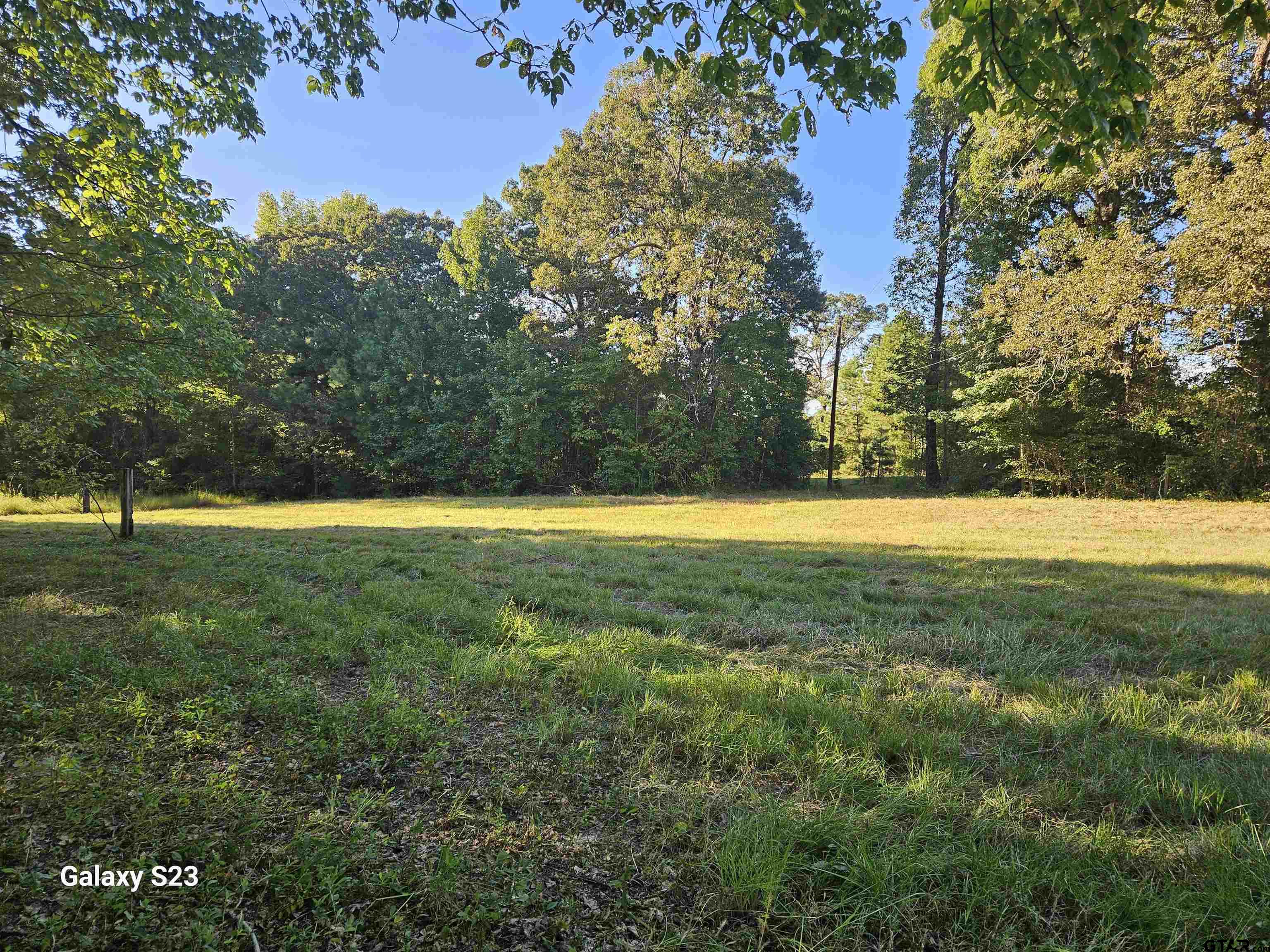 15830 Shady Creek Road Tyler, TX 75705 - Photo 28 of 32 a view of outdoor space with trees all around