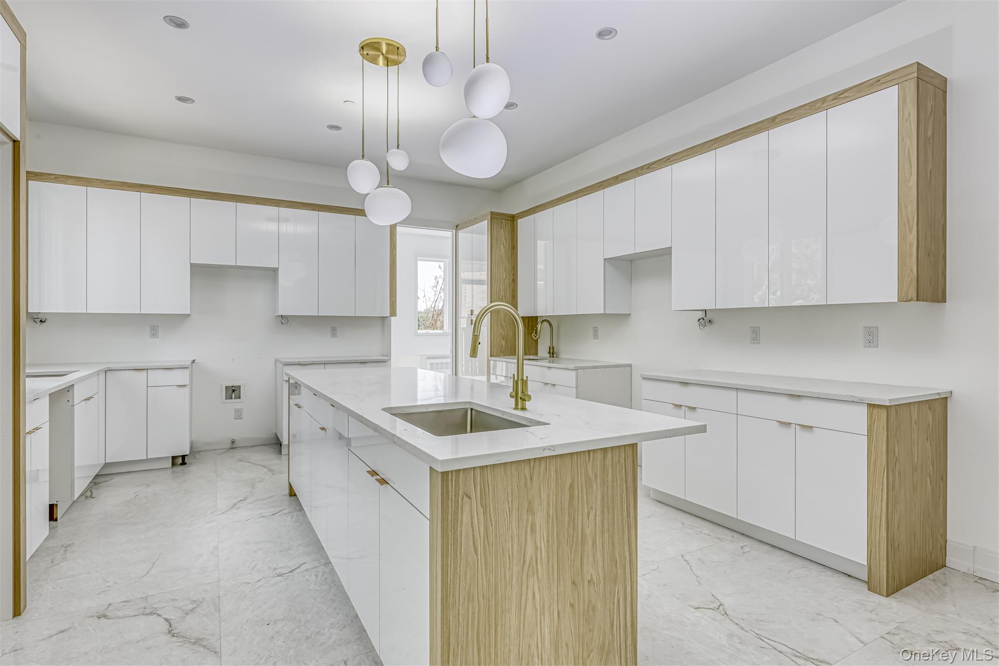 128 Union Road, Unit 201 Spring Valley, NY 10977 - Photo 14 of 48 Kitchen featuring white cabinetry, hanging light fixtures, light marble finish flooring, and recessed lighting