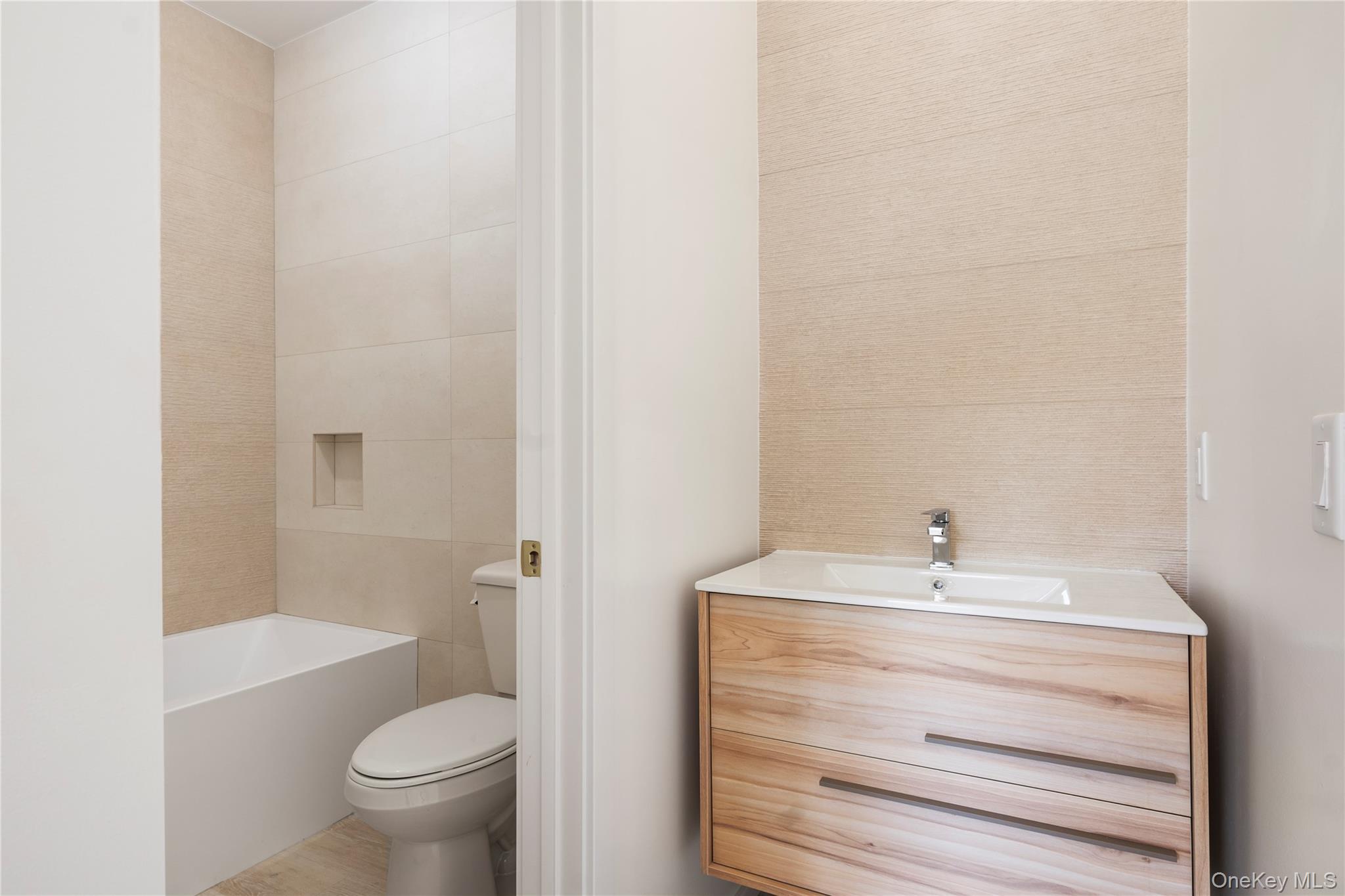 128 Union Road, Unit 201 Spring Valley, NY 10977 - Photo 47 of 48 Full bath with vanity and toilet at guest apartment