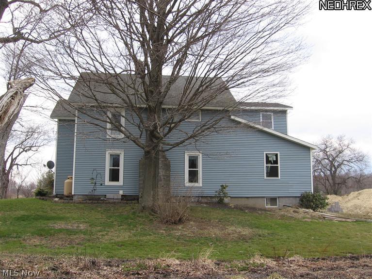 3103 East Maple Road Jefferson, OH 44047 - Photo 3 of 15 East side of home