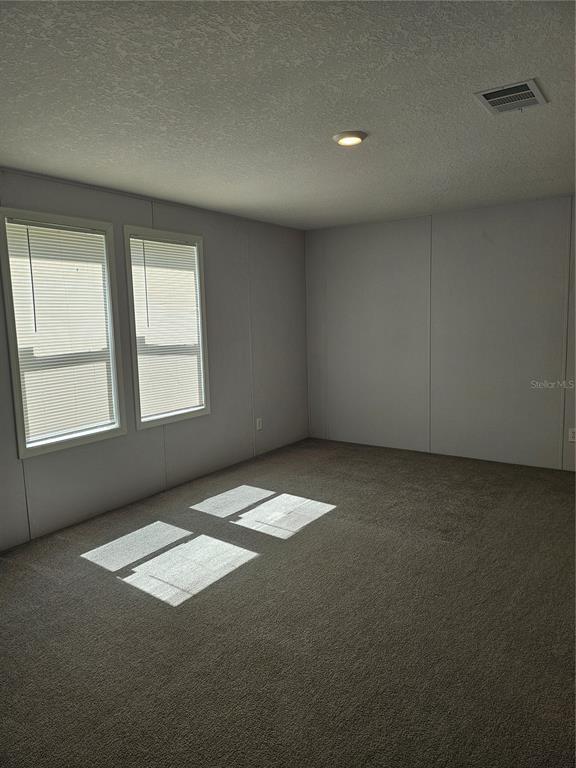 5636 West O Griffin Road Plant City, FL 33567 - Photo 20 of 20 an empty room with a empty space and windows
