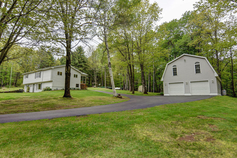 154 Jackson Hill Road Minot, ME 04258 - Photo 2 of 35 2-car garage w/finished space overhead.