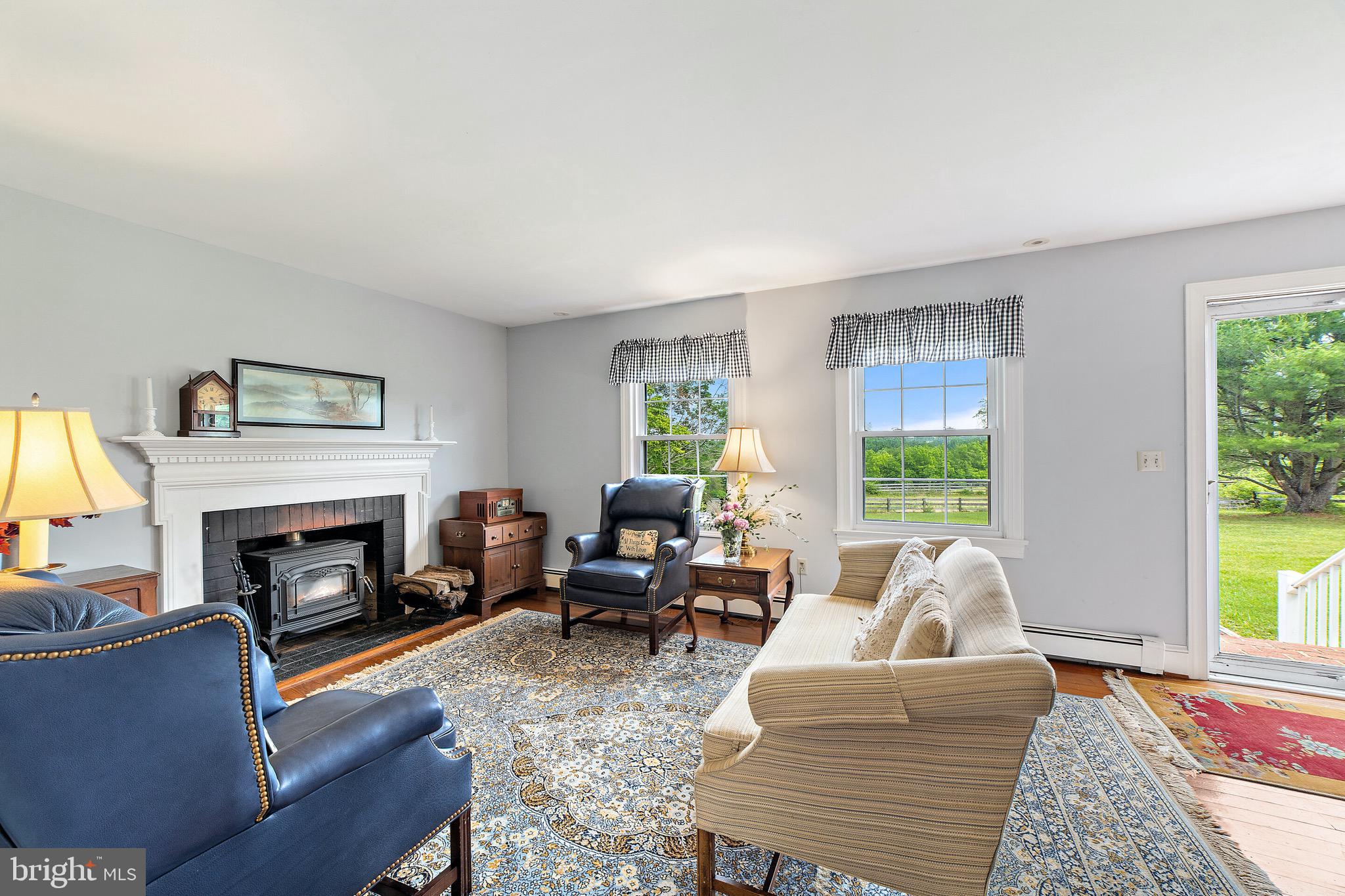 16356 Ryland Chapel Road Rixeyville, VA 22737 - Photo 2 of 36 Living room w/wood stove insert in fireplace