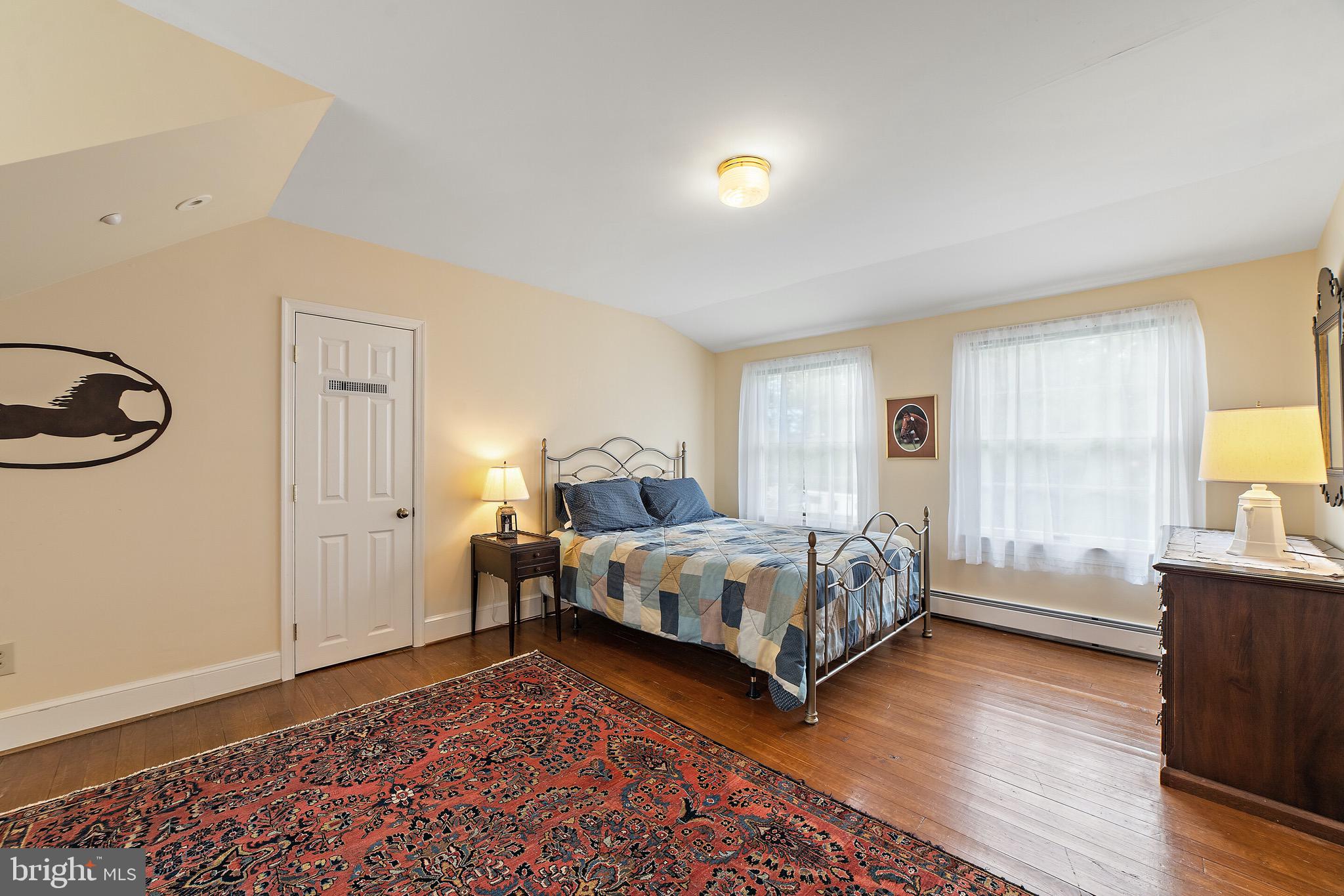 16356 Ryland Chapel Road Rixeyville, VA 22737 - Photo 21 of 36 Door next to bed leads to studio/alcove upstairs