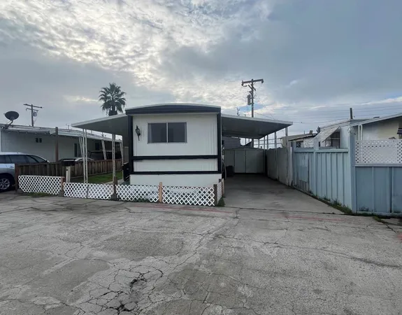 a view of a house with a garage