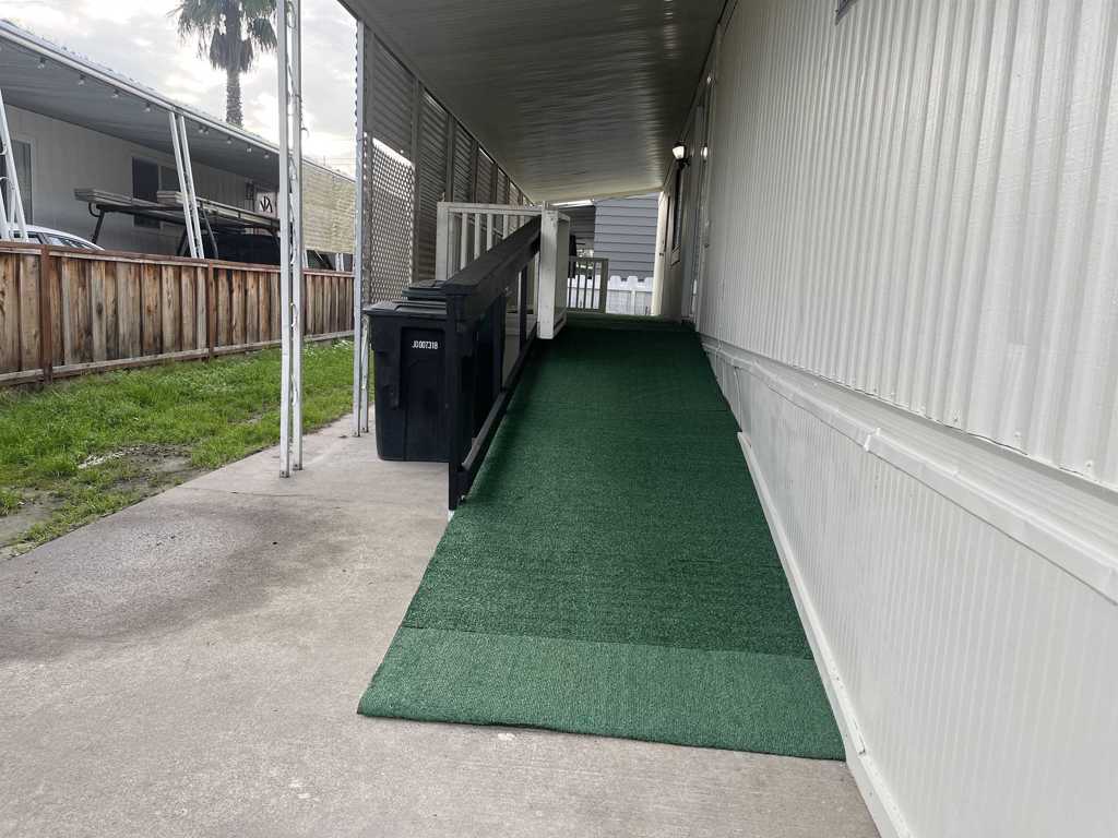 4143 Yosemite Boulevard Modesto, CA 95357 - Photo 3 of 22 a view of a backyard with wooden fence