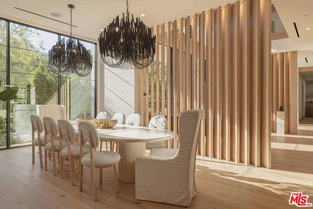 16036 Woodvale Road Encino, CA 91436 - Photo 11 of 54 a dining room with furniture and window