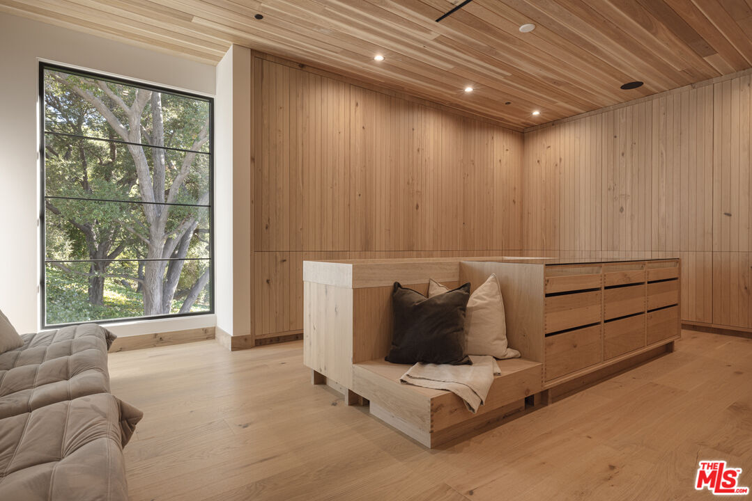 16036 Woodvale Road Encino, CA 91436 - Photo 31 of 54 a living room with furniture