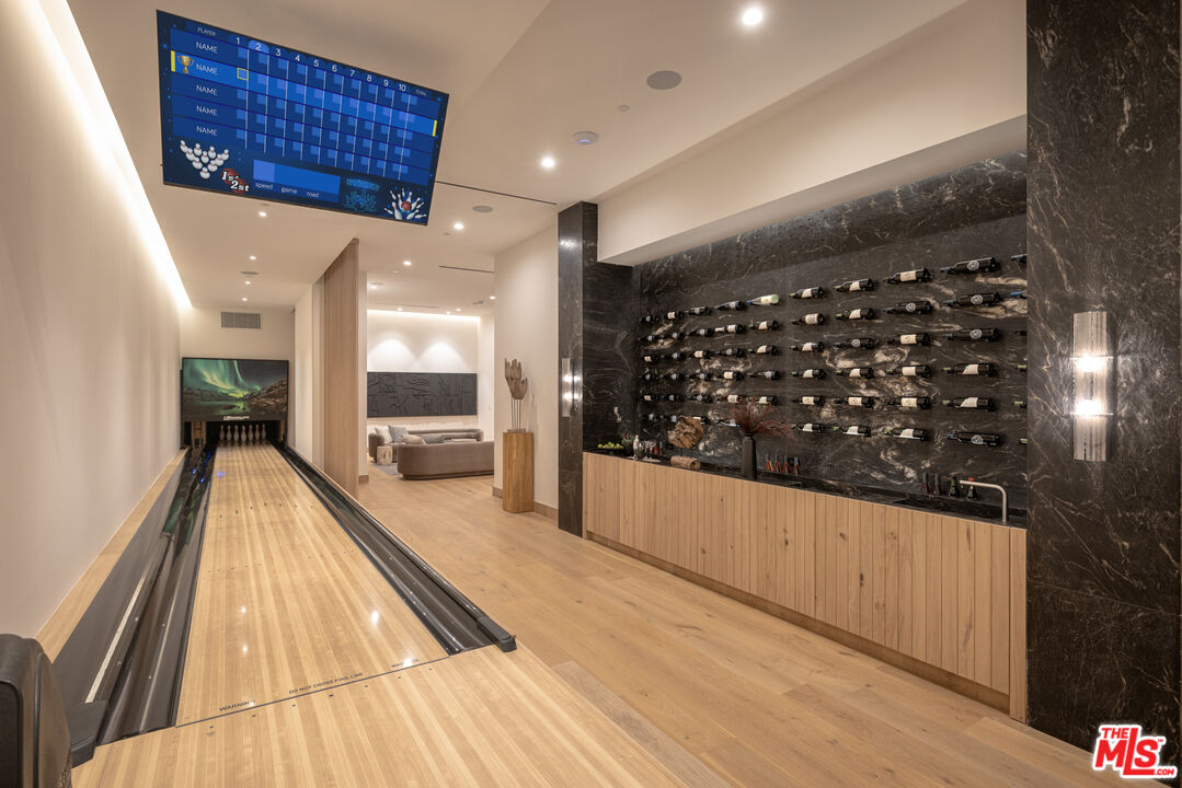 16036 Woodvale Road Encino, CA 91436 - Photo 42 of 54 a lobby with entryway and wooden floor