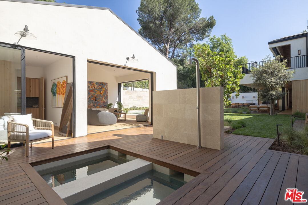 16036 Woodvale Road Encino, CA 91436 - Photo 43 of 54 a view of outdoor space kitchen living room and kitchen