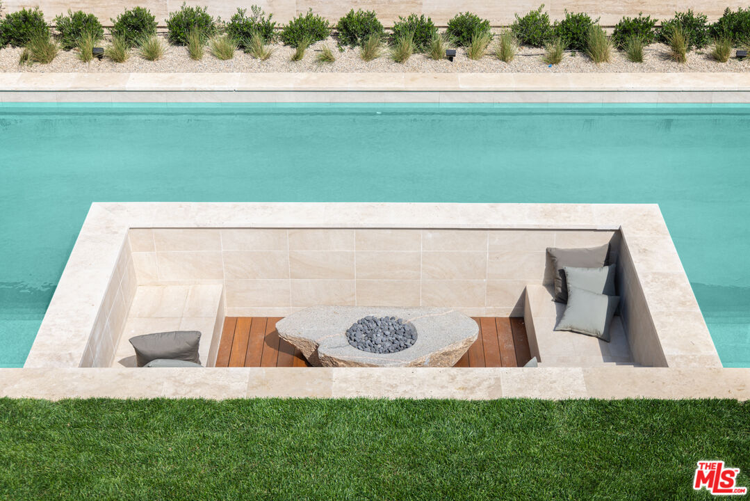 16036 Woodvale Road Encino, CA 91436 - Photo 45 of 54 a view of a yard with an outdoor space