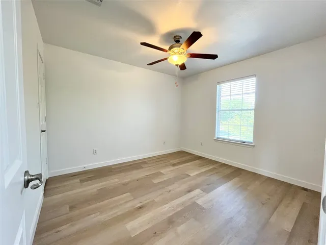 a bathroom with a double vanity sink and mirror