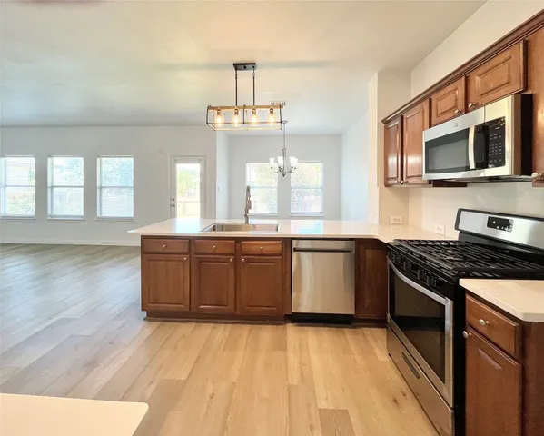 a view of a chandelier in a room