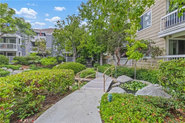 a view of a garden with pathway