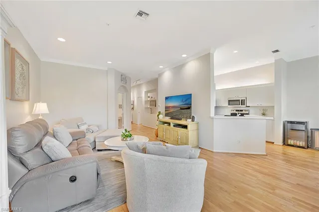 $10,000 | 400 Lambiance Circle, Unit 204, Naples, FL 34108