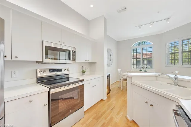 $10,000 | 400 Lambiance Circle, Unit 204, Naples, FL 34108