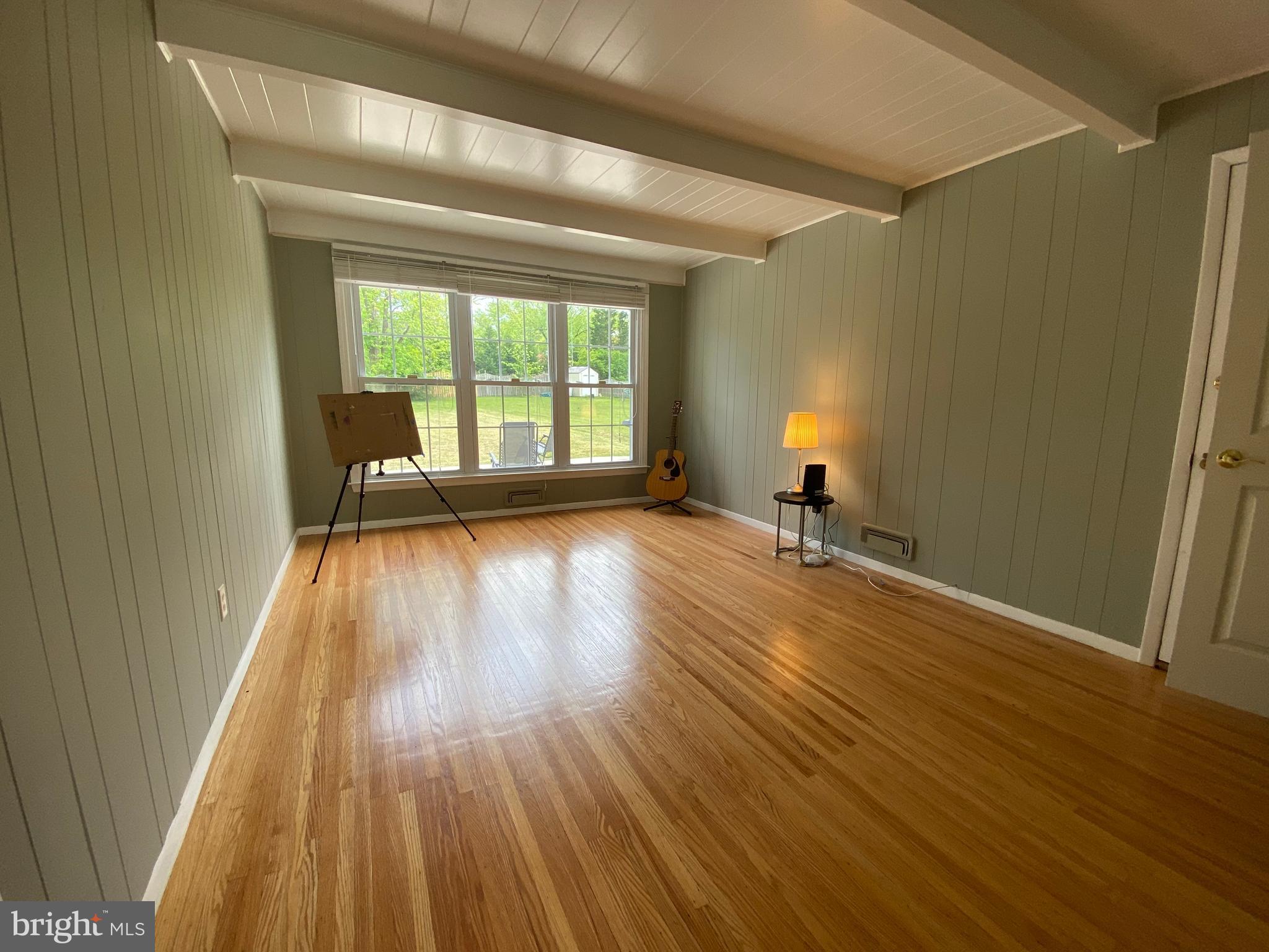555 Tarrington Road Cherry Hill, NJ 08034 - Photo 7 of 19 a view of empty room with wooden floor and fan