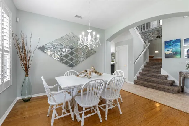 a living room with fireplace furniture and a flat screen tv