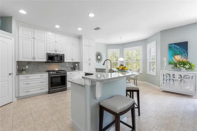 a bathroom with a sink toilet and mirror