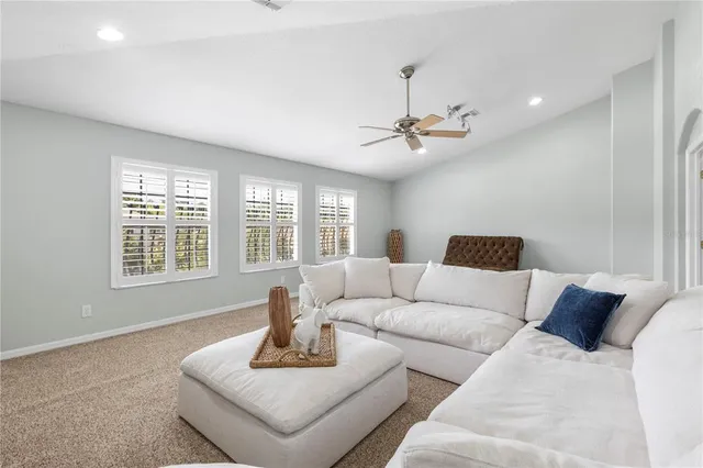 a view of a tables and chairs under an umbrella