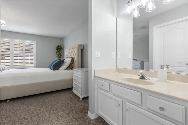 an aerial view of a house with a garden