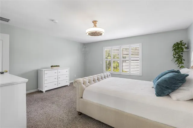 an aerial view of a house with a garden